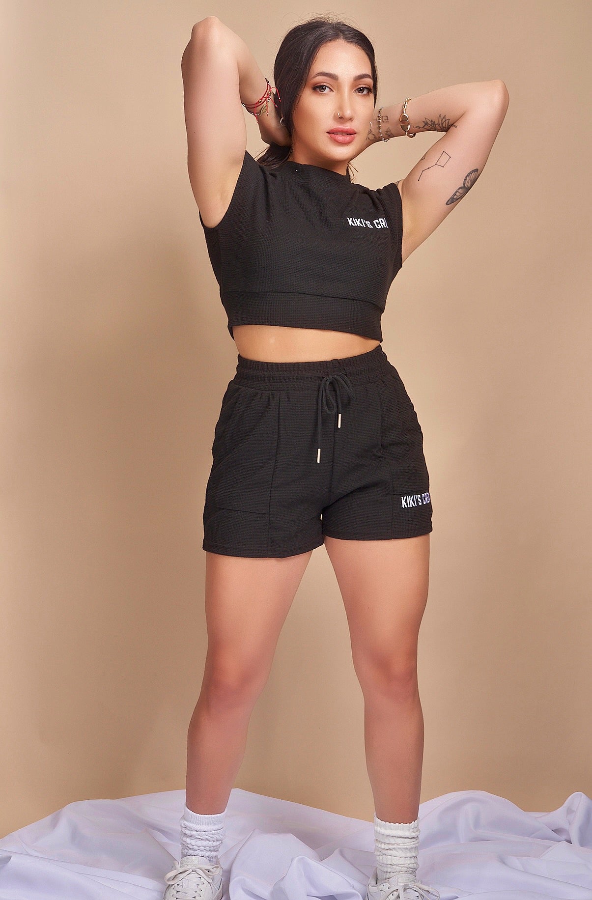 Model 1 wearing size small of the kiki's crew boxing set
