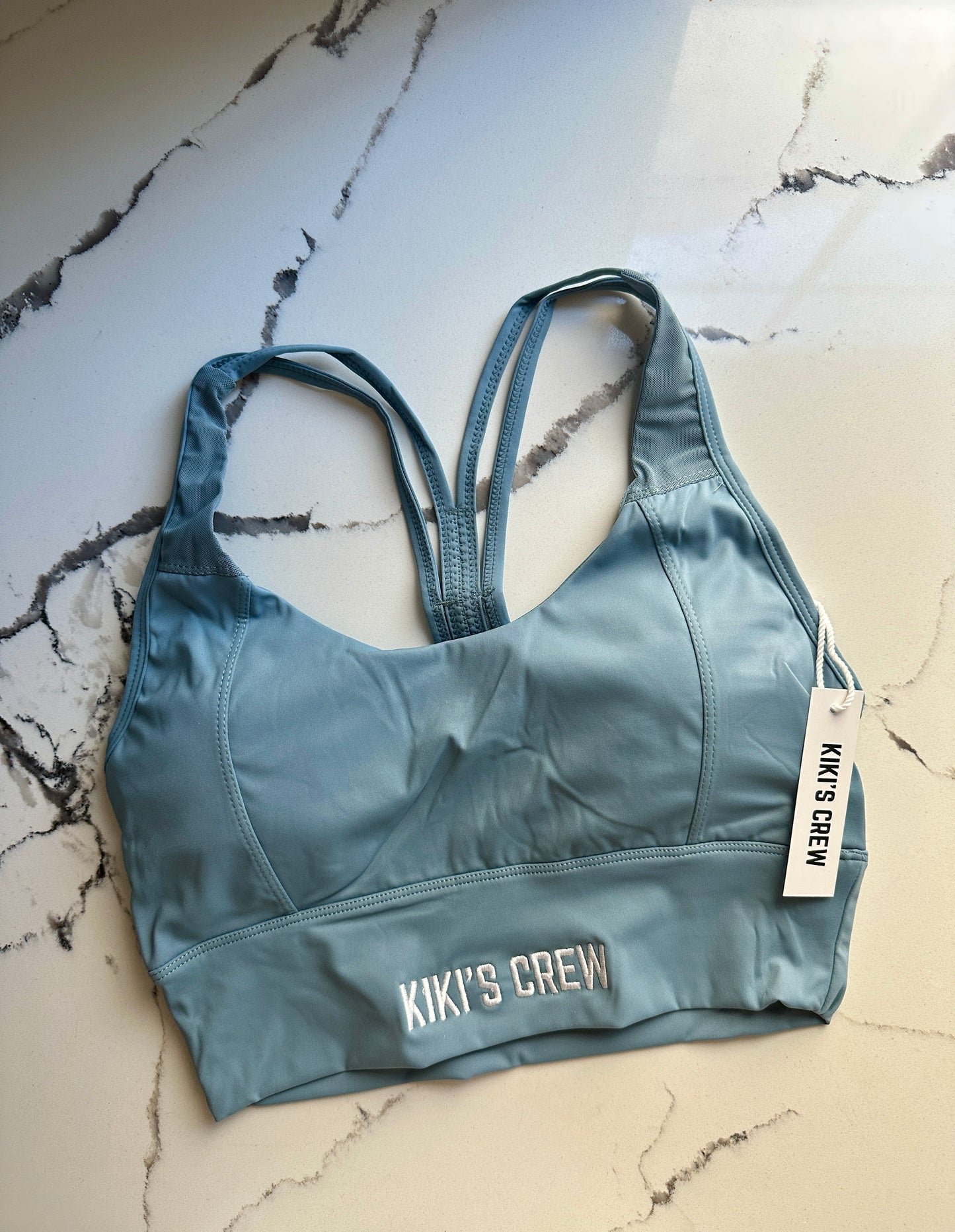 Medium kiki's crew baby blue sports bra
