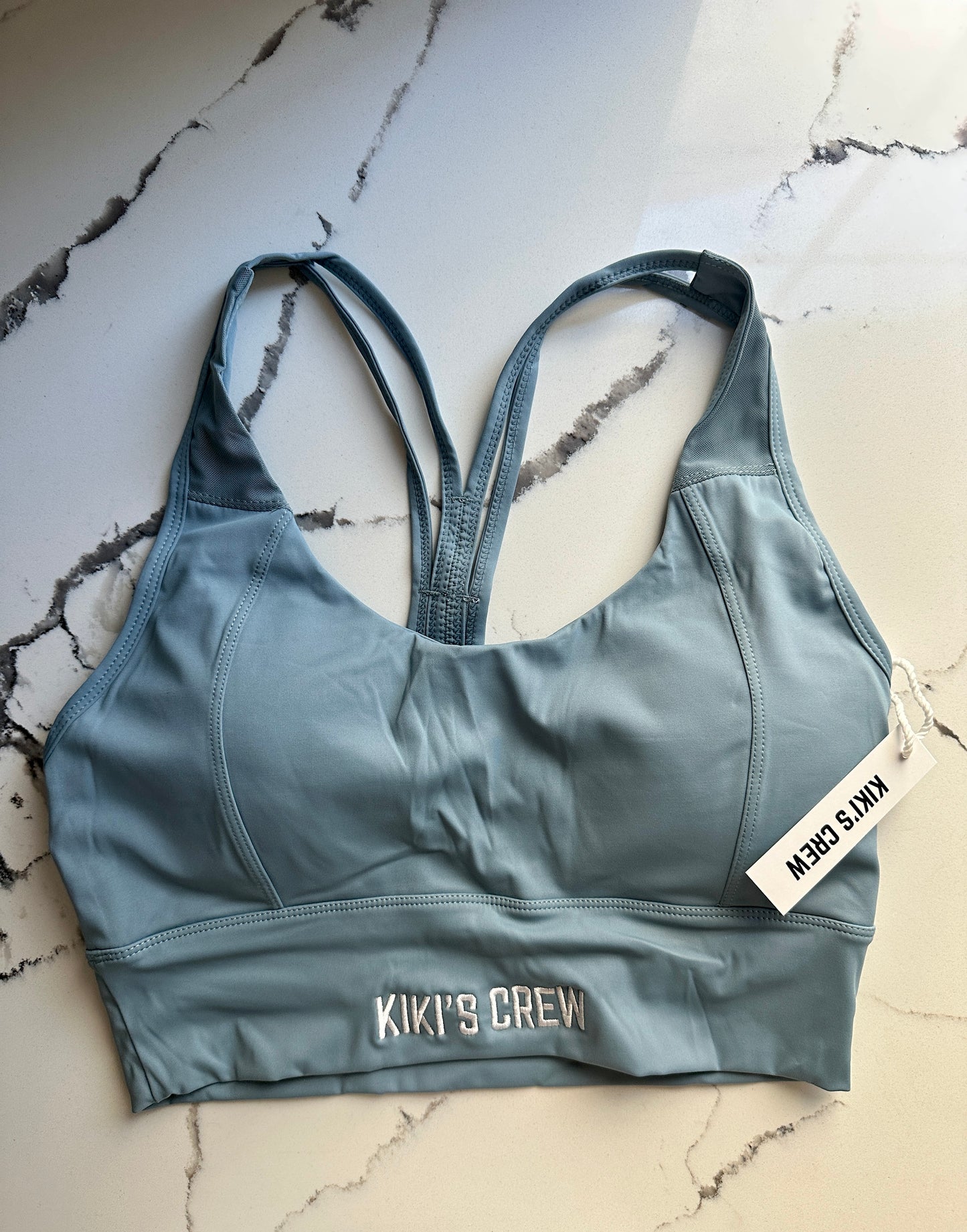 Large kiki's crew baby blue sports bra
