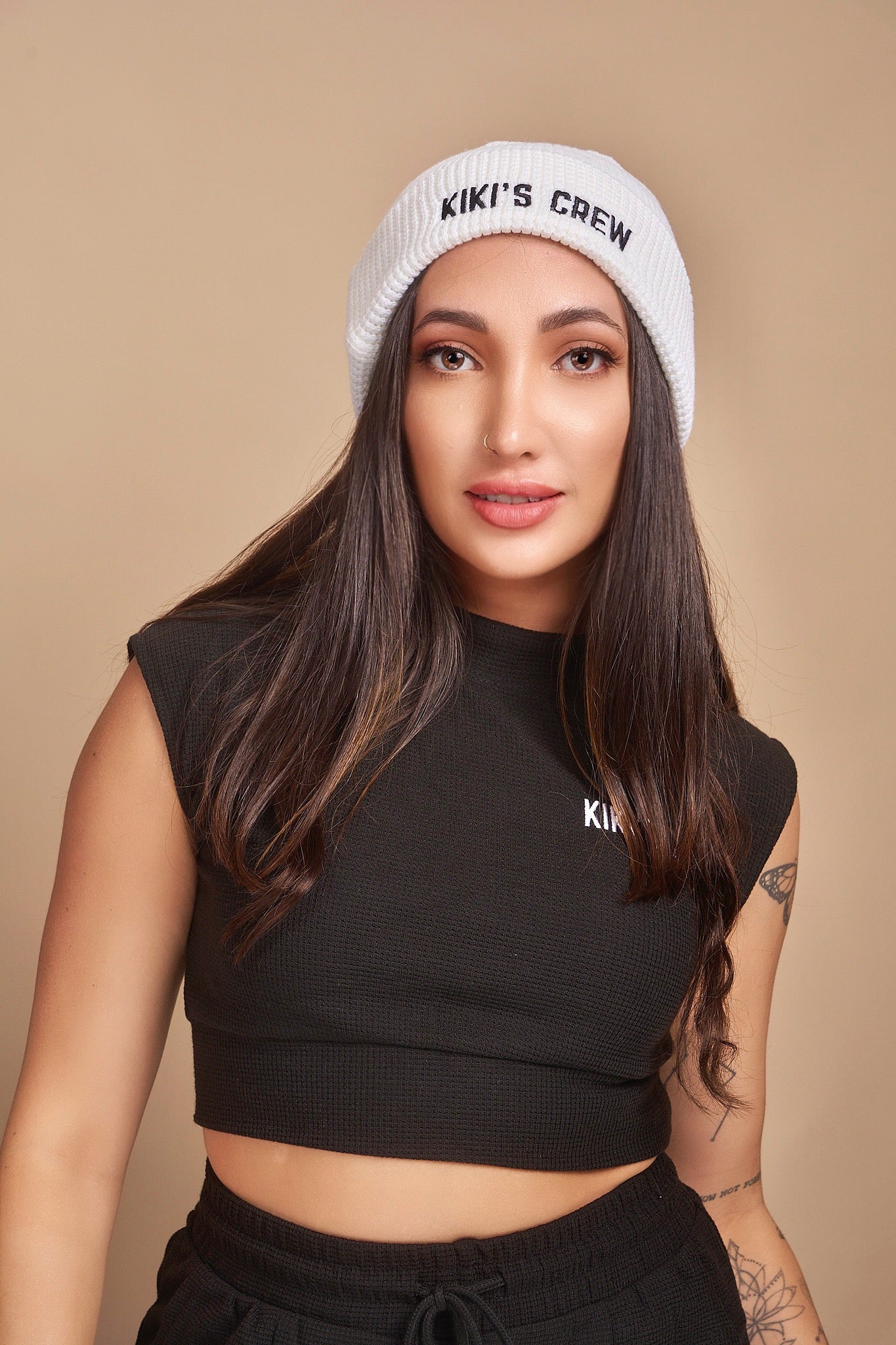 Model 1 wearing Kiki's Crew White Beanie along with Kiki's Crew Boxing Set size small. Beanies are one size fits all  and are unisex