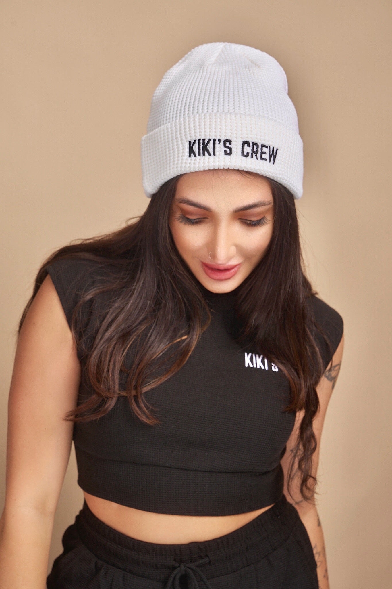 Model 1 wearing Kiki's Crew White Beanie along with Kiki's Crew Boxing Set size small. Beanies are one size fits all  and are unisex